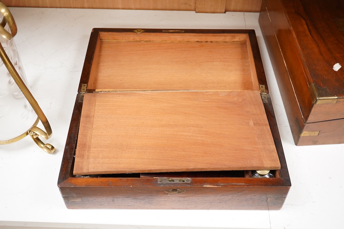A Victorian walnut rising slope together with a rosewood writing slope